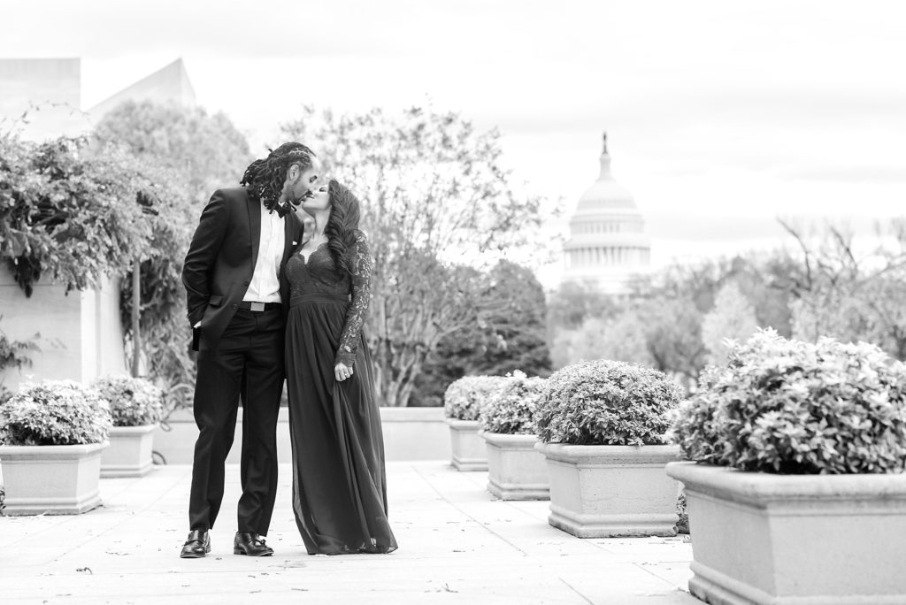 bride and groom kiss by US capitol