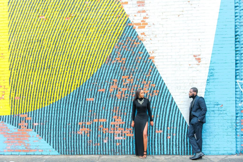 NYC engagement session blue and yellow wall