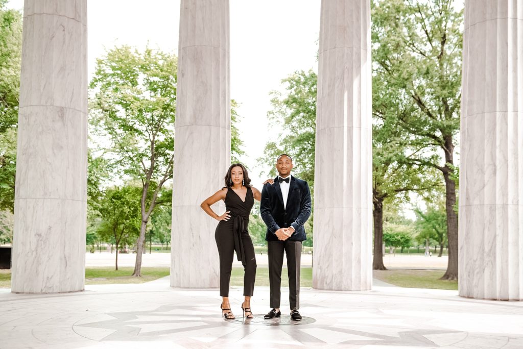 couple posing in WWII memorial first year anniversary session with Terri Baskin Photography