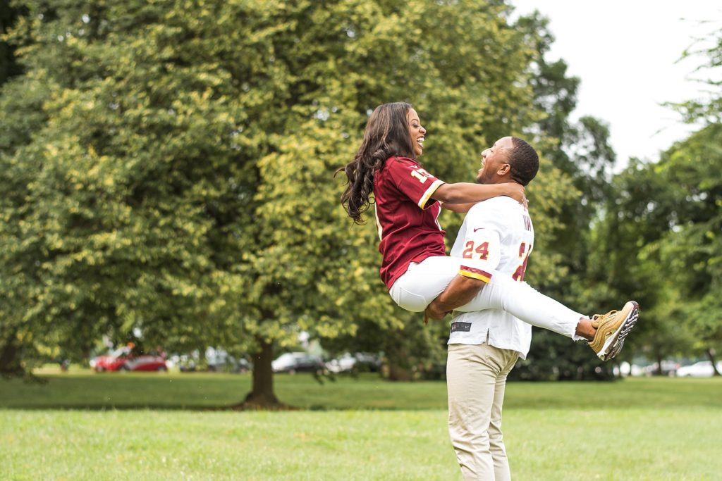 playful in Redskins Jerseys first year anniversary session with Terri Baskin Photography